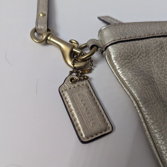 Like new Coach Metallic Champagne Gold Wristlet Clutch - Picture 2 of 16